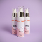 Three bottles of Bliss Point Luxe Glow Nourishing Moisturizer on a pink and green gradient background.